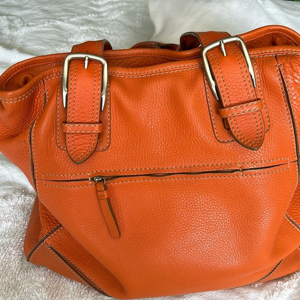 Large leather Cole Haan orange shoulder bag with silver hardware buckles. - Picture 5 of 16